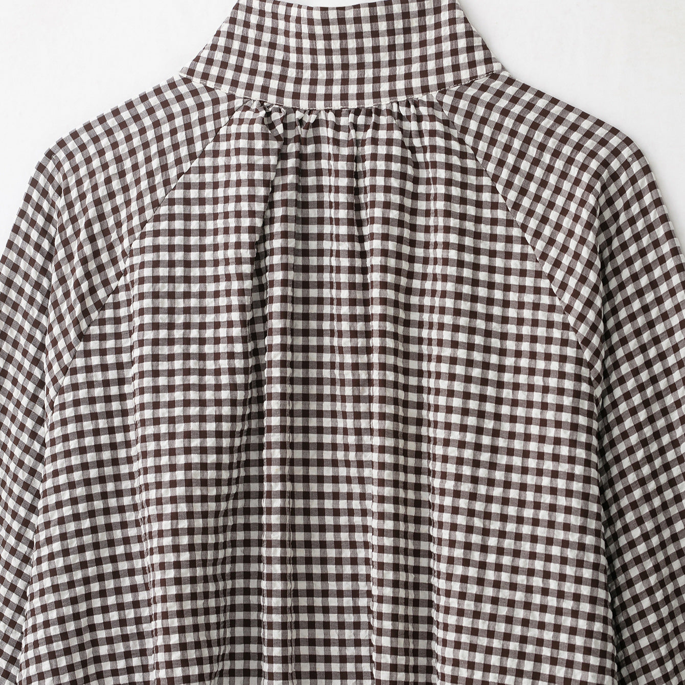 Women’s check blouse with stand-up collar, button closure and drawstring hem Chichicherry