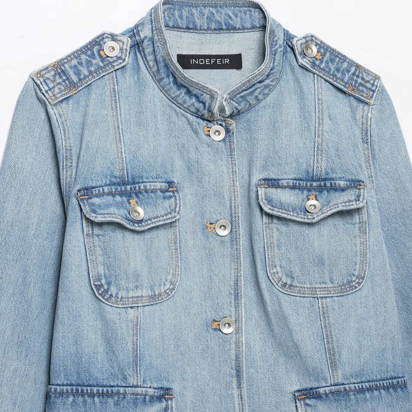 Women's jeans field jacket with stand-up collar, shoulder patches, and four flap pockets Chichicherry