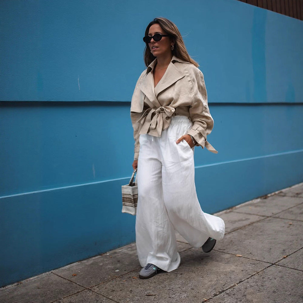 Women’s short trench coat with waist knot detail, cape sleeves, and boxy cropped cut Chichicherry