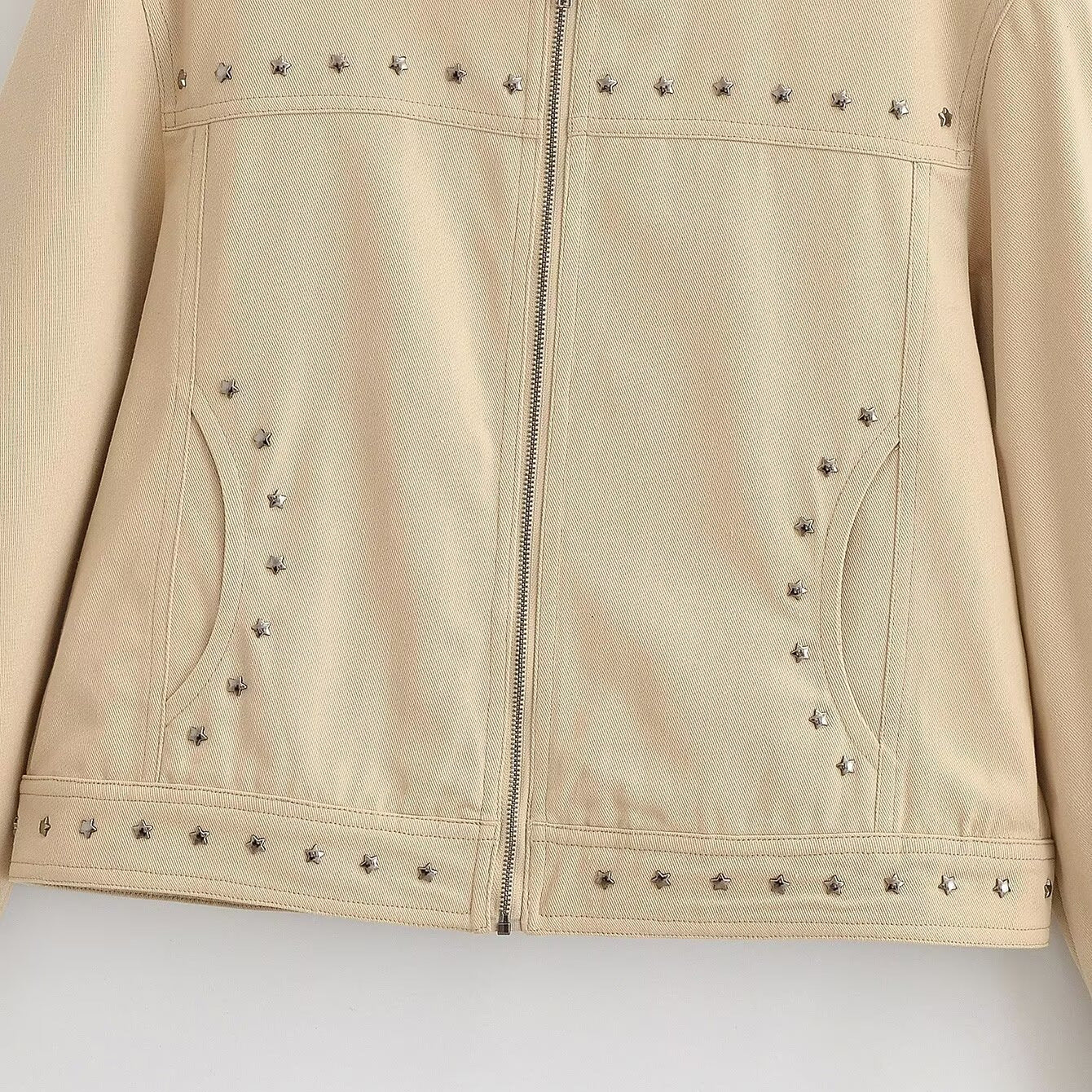 Women’s short-cut vegan leather jacket with stand-up collar, full-length zipper and star stud detail Chichicherry