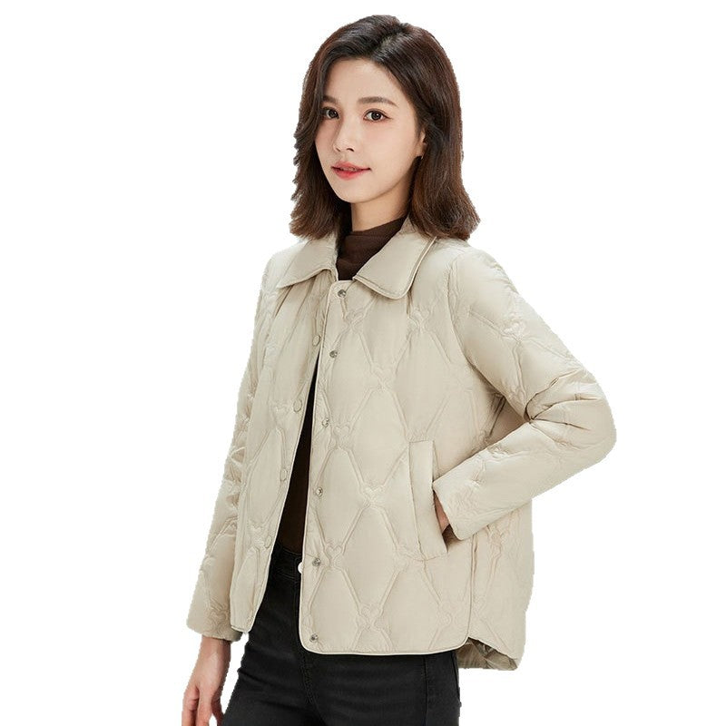 Women Short Cut Quilted Jacket with Decorative Stitching and Rounded Hem Chichicherry
