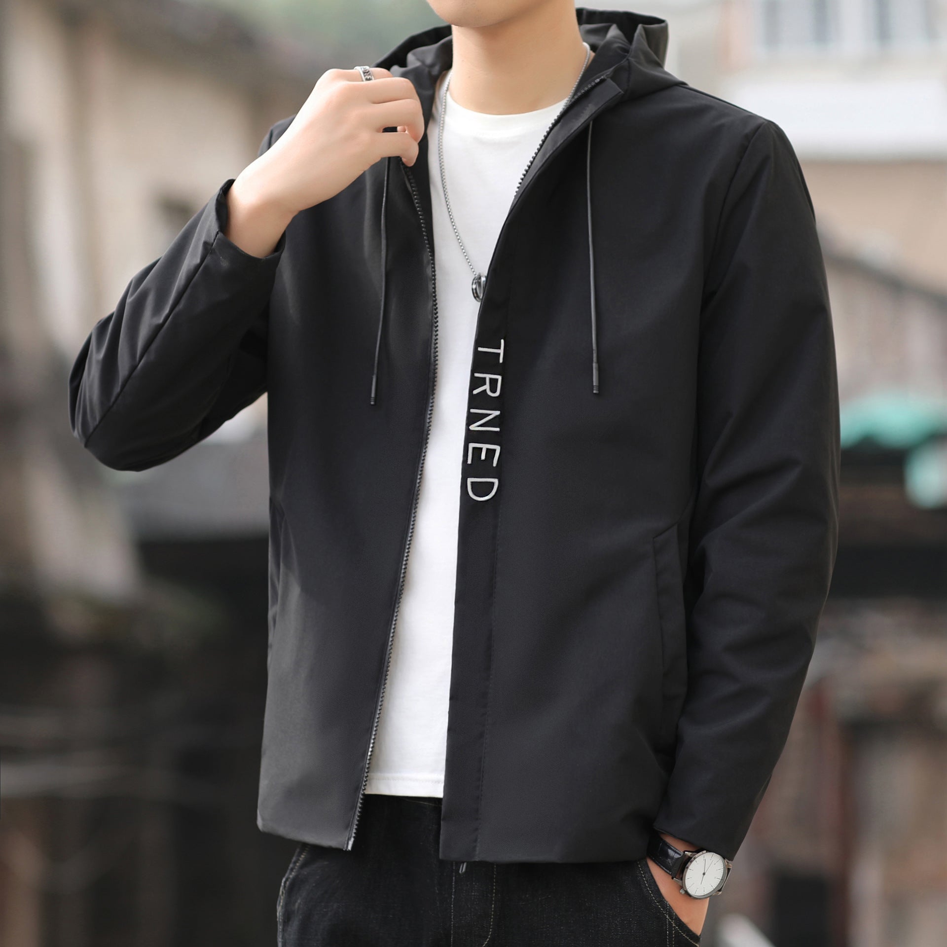 Men's lightweight hooded shell jacket with concealed zipper and minimalist utility look Chichicherry