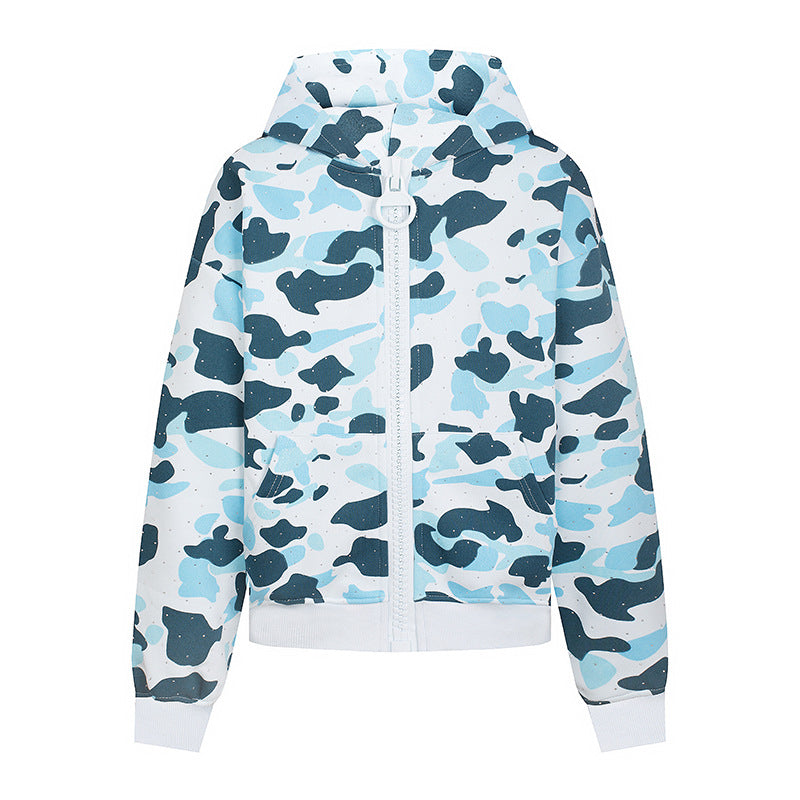 Ladies' hooded jacket in camouflage print with a full-length zipper, kangaroo pocket, and ribbed cuffs.