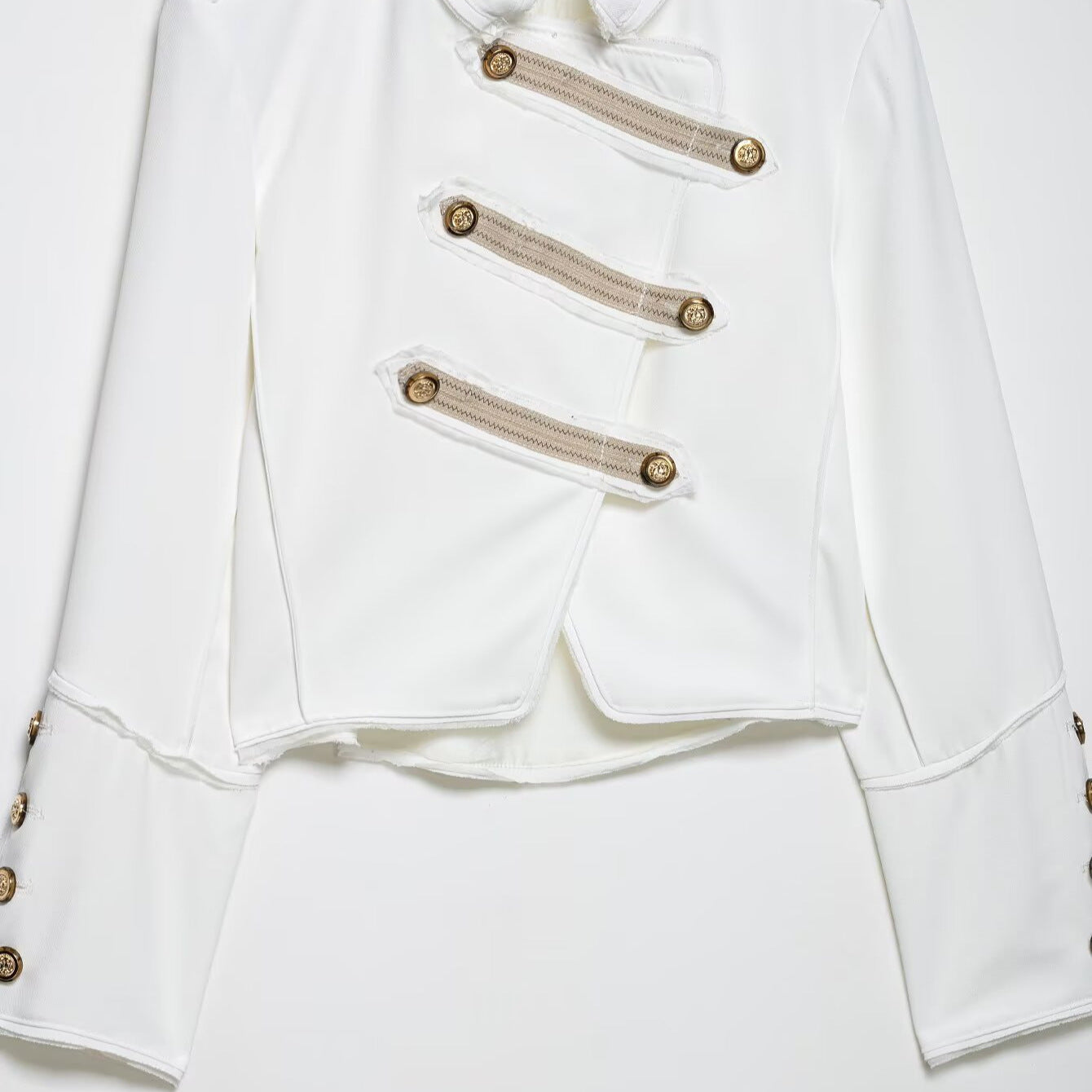 Ladies short jacket in military style with asymmetrical decorative strip, shoulder epaulettes and gold buttons Chichicherry