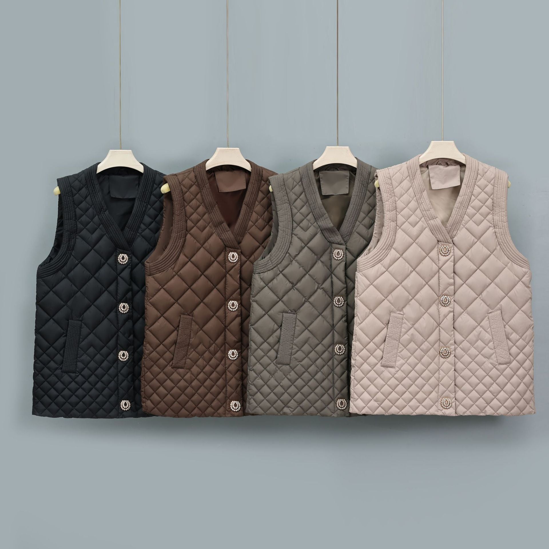 Ladies nano quilted vest with decorative buttons and V-neck Chichicherry