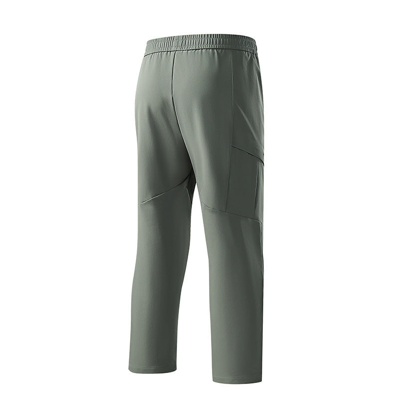 Men's technical tapered training pants with elastic waistband, 4-way stretch and zip pockets Chichicherry