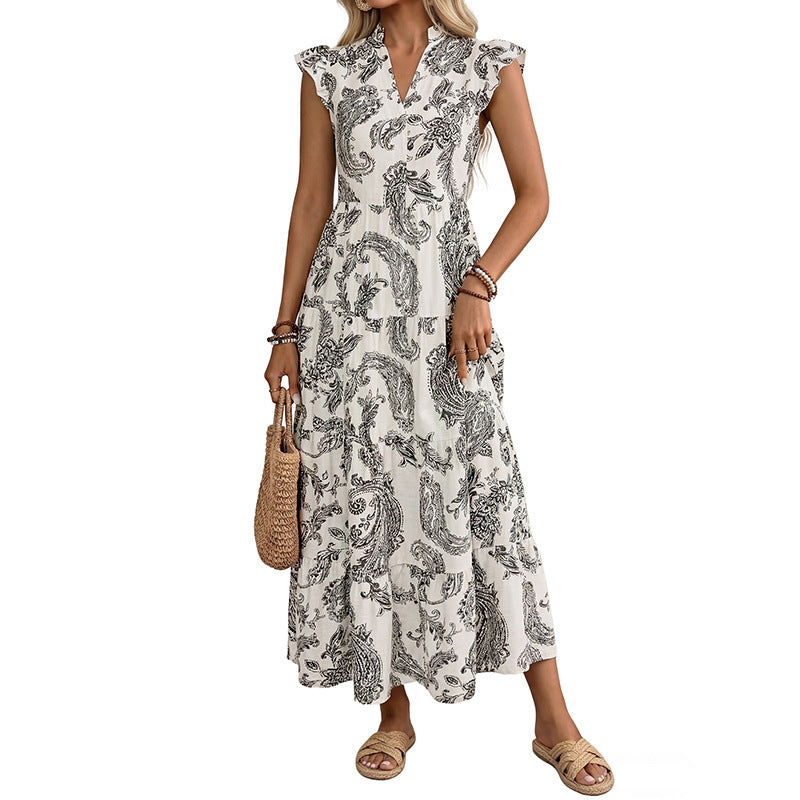 Women's maxi dress with paisley print, V-neck and tiered skirt Chichicherry
