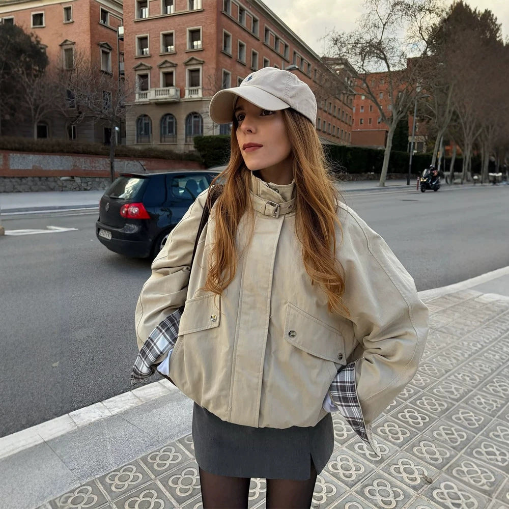 Women’s short bomber jacket with stand-up collar, chin strap, and checkered sleeve lining Chichicherry