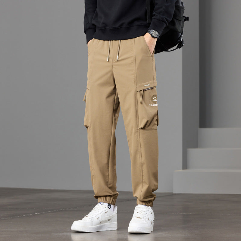 Men's technical cargo jogger pants with elastic hem, multi pockets, and drawstring Chichicherry