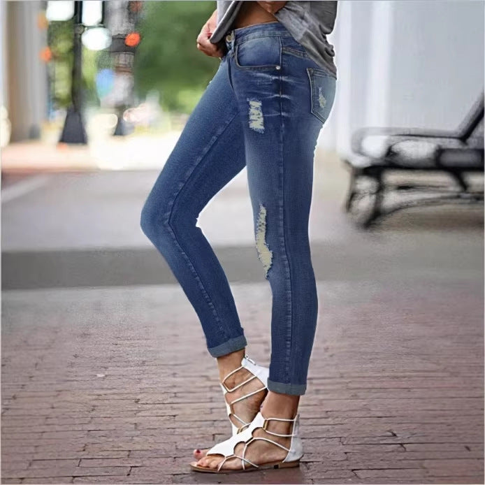 Women's Cropped Slim-Fit Denim Pants with mid-rise waist, cuffed hem and subtle used look Chichicherry