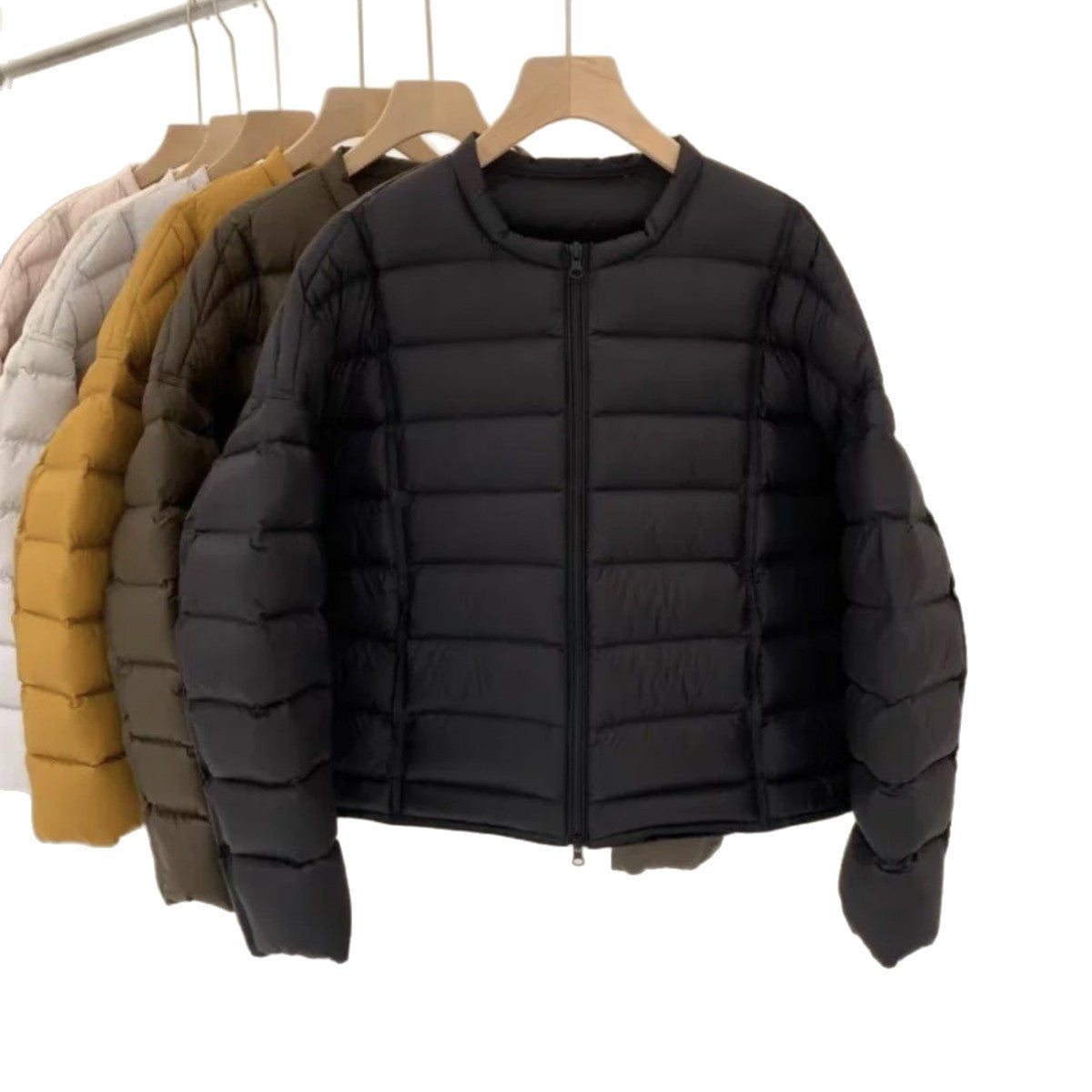 Ladies short cut ultra-light quilted jacket with round neck and two-way zipper Chichicherry