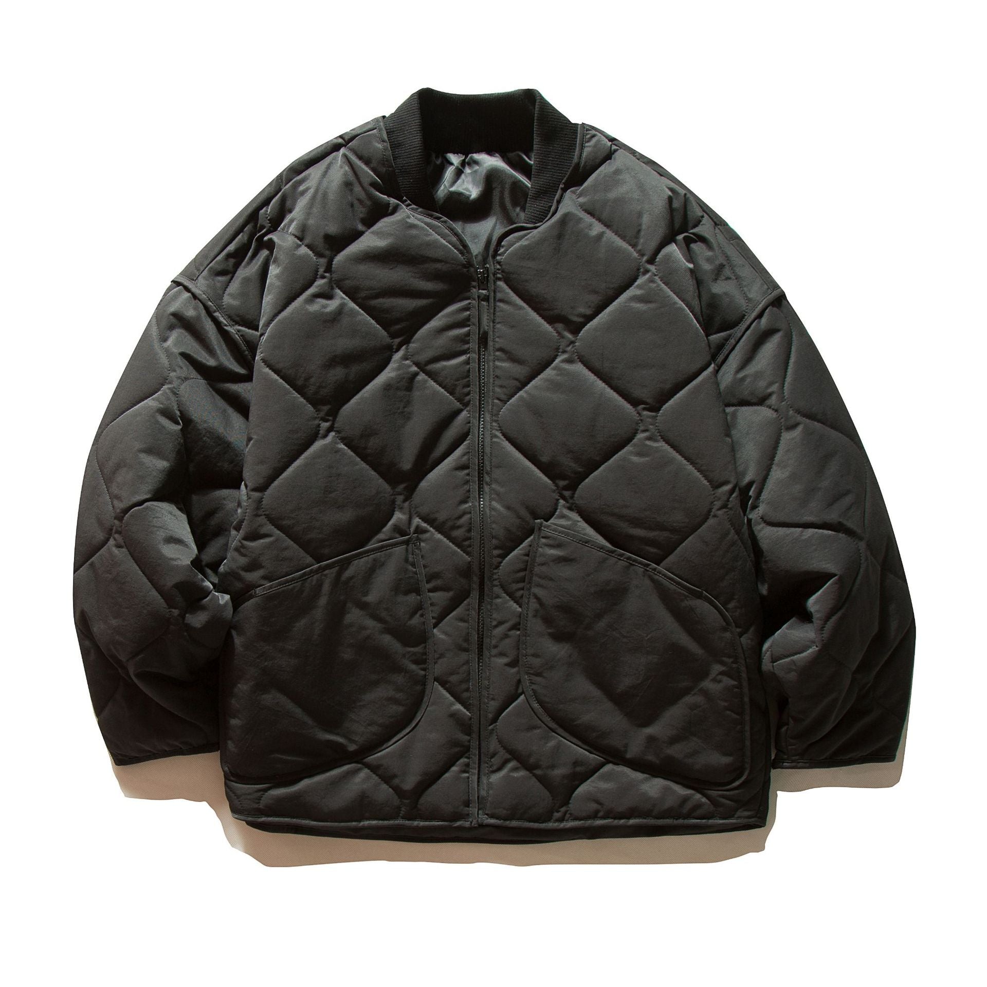 Unisex Short quilted bomber in boxy cut with ribbed collar and extra large flap pockets Chichicherry