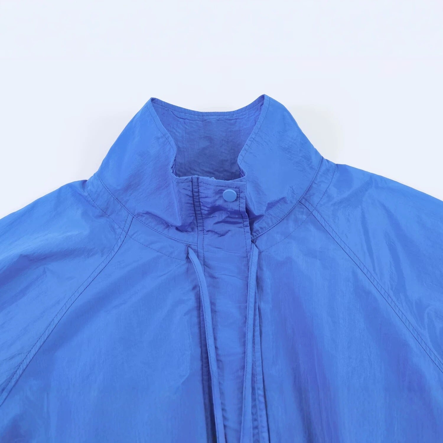 Women's Lightweight Wind and Travel Jacket with Stand Collar, Concealed Snap Placket and Drawstring Hem Chichicherry