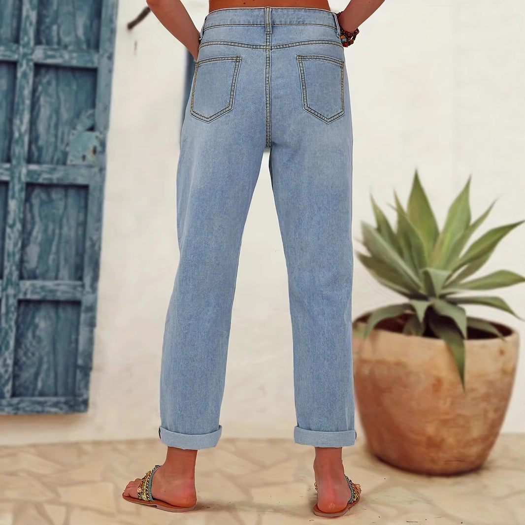 Ladies straight-cut jeans with colorful floral appliqués and light destruction details Chichicherry