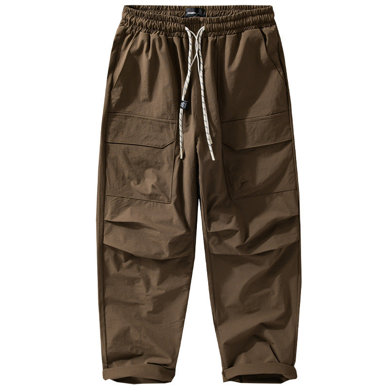 Men's Oversized Cargo Pants made of lightweight functional fabric with drawstring waistband and multiple pockets Chichicherry