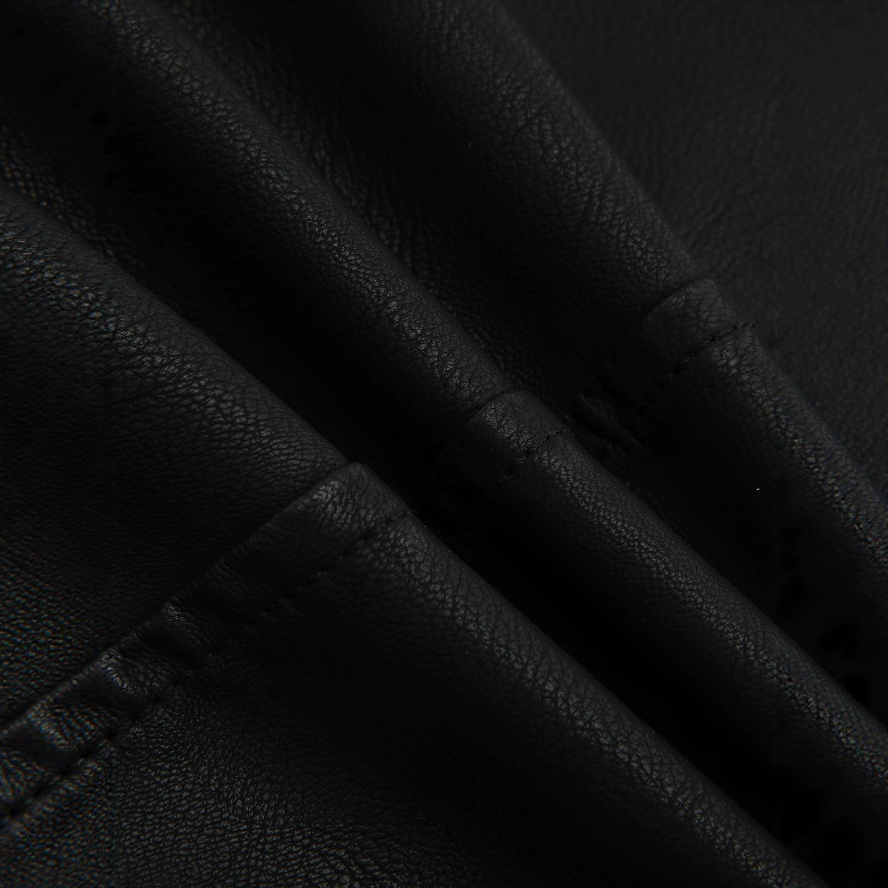 Ladies Tailored Biker Jacket made of Leatherette with Quilted Shoulder Area and Asymmetrical Zipper Chichicherry