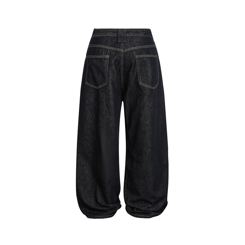 Women's high-waisted baggy jeans in balloon shape with visible button placket and prominent seams Chichicherry