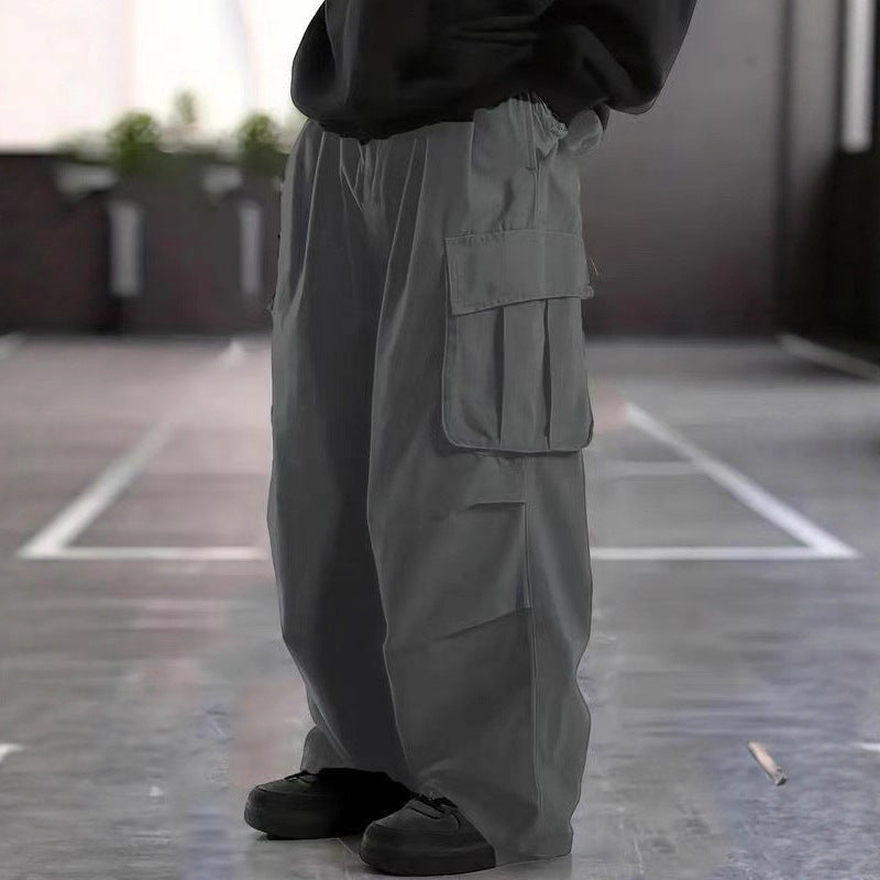 Men's Oversized Baggy Cargo Pants in Urban Utility Style with Elastic Drawstring Waistband and Multiple Flap Pockets Chichicherry