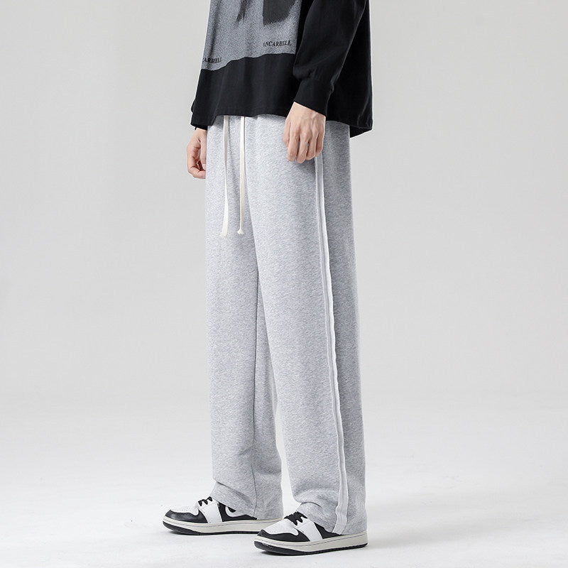 Men's wide jogging pants in oversized fit with side stripes, drawstring & fleece lining Chichicherry