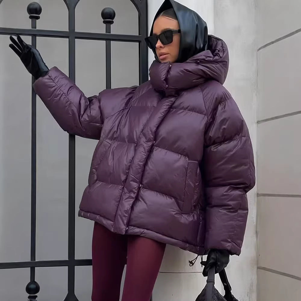 Ladies short padded oversized quilted jacket with high standing collar and hood Chichicherry