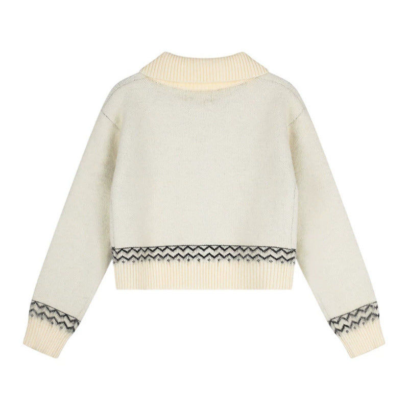 Women's short knitted cardigan in Norwegian jacquard with lapel collar and button closure Chichicherry