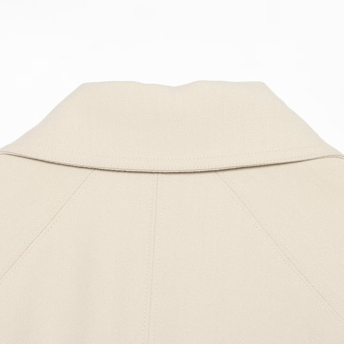 Women's cropped jacket in minimalist trench style with wide shirt collar and tie belt Chichicherry
