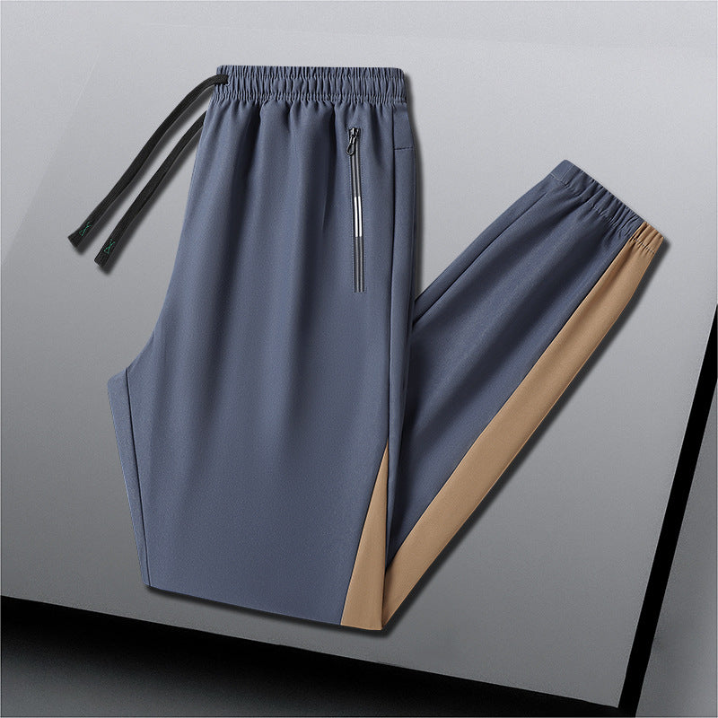 Men's Breathable Training Pants with Elastic Waistband, Zipper Pockets and Side Contrast Stripes Chichicherry