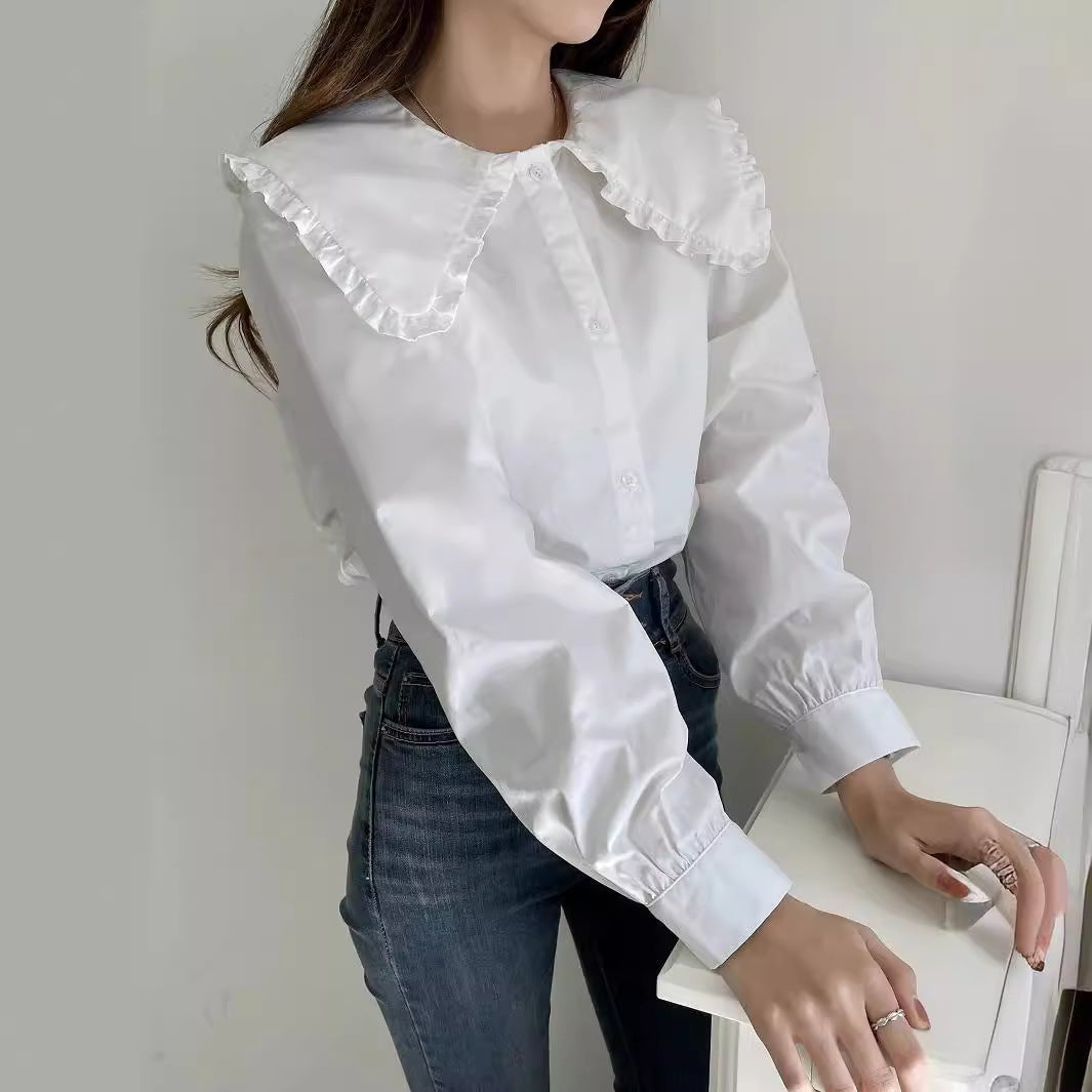 Women's blouse with oversized ruffle collar and finely crafted tailoring Chichicherry