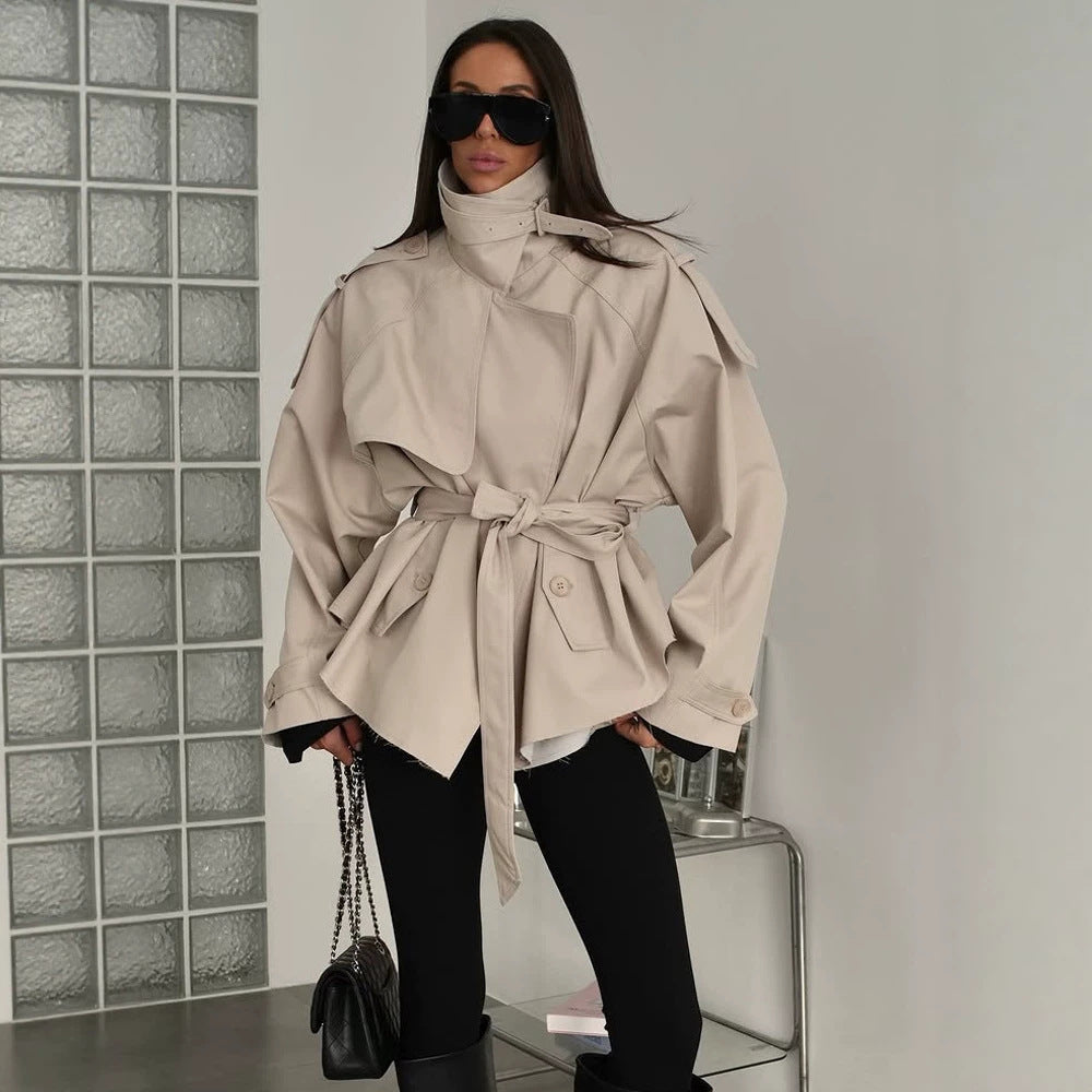 Women's short trench coat with wide standing collar, shoulder epaulettes, and waist belt Chichicherry