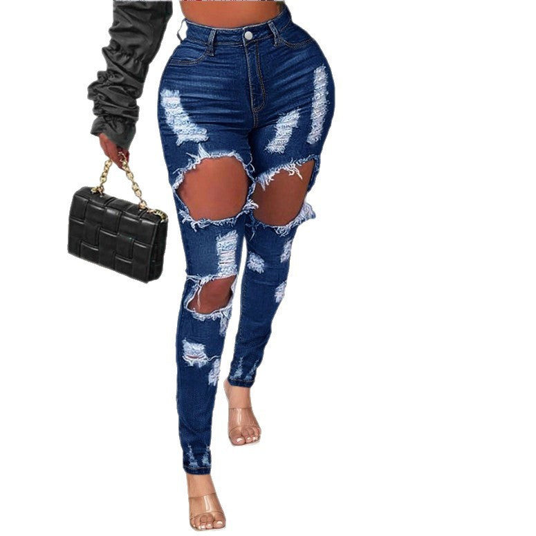 Ladies high-waisted skinny jeans with XXL knee cutouts, heavily distressed used look and sculpting cut Chichicherry