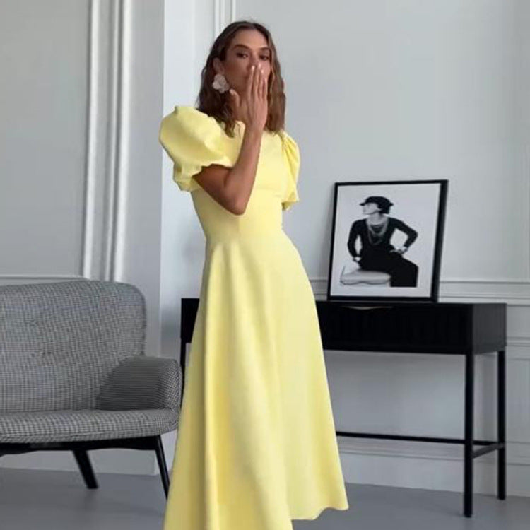 Women’s midi dress with a tailored A-line and voluminous puff sleeves Chichicherry