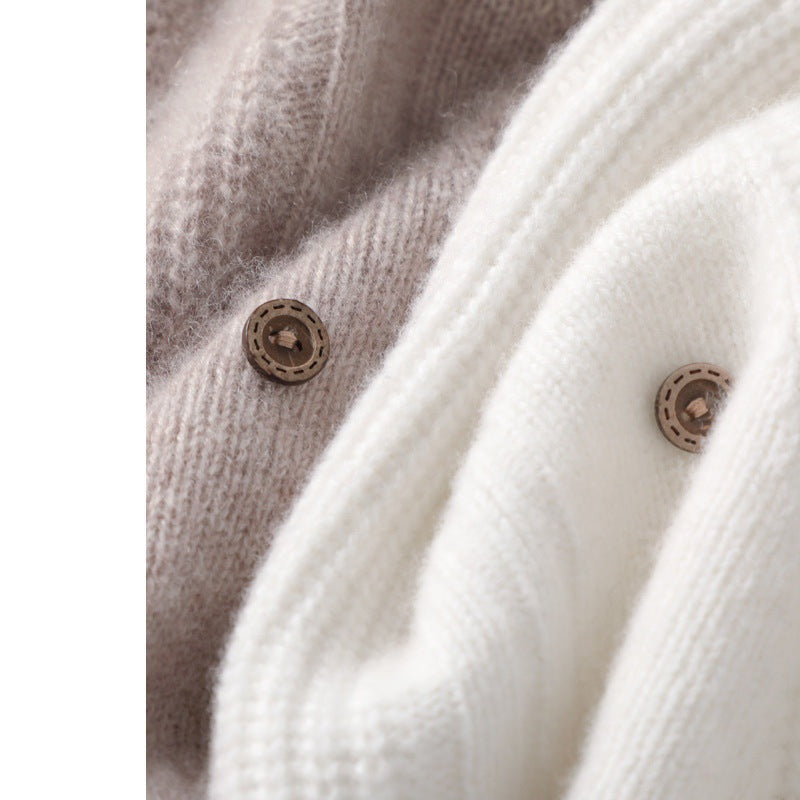 Ladies' knitted long vest with V-neck, cable pattern and side button placket Chichicherry
