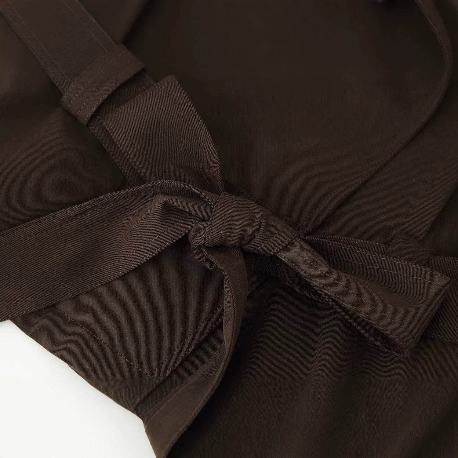 Women's short trench-style jacket with tie belt, raglan sleeves, and tailored fit Chichicherry