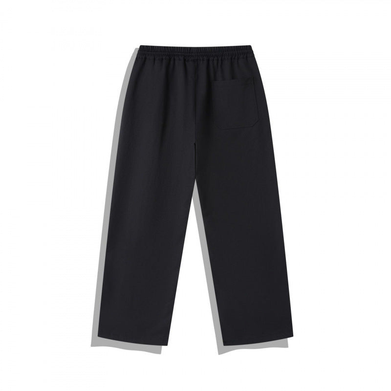 Unisex Wide Relaxed Pants with Elastic Waistband, Drawstring and Decorative Stitching Chichicherry