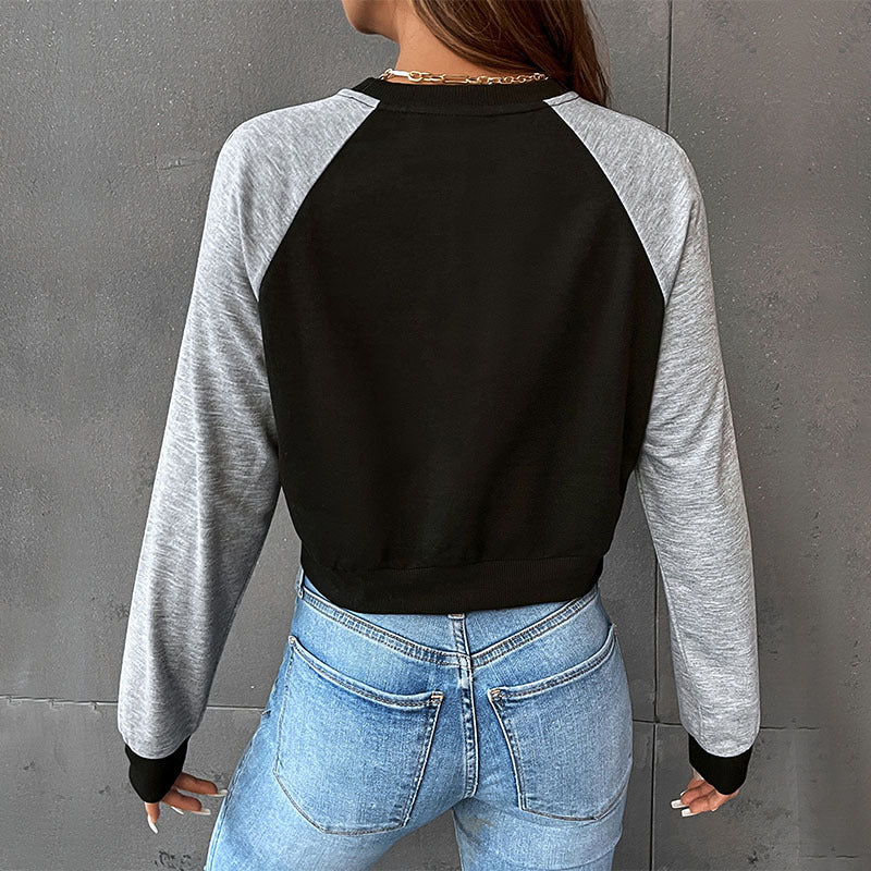 Women's short cut raglan sweatshirt with thumb hole cuffs and elastic hem Chichicherry