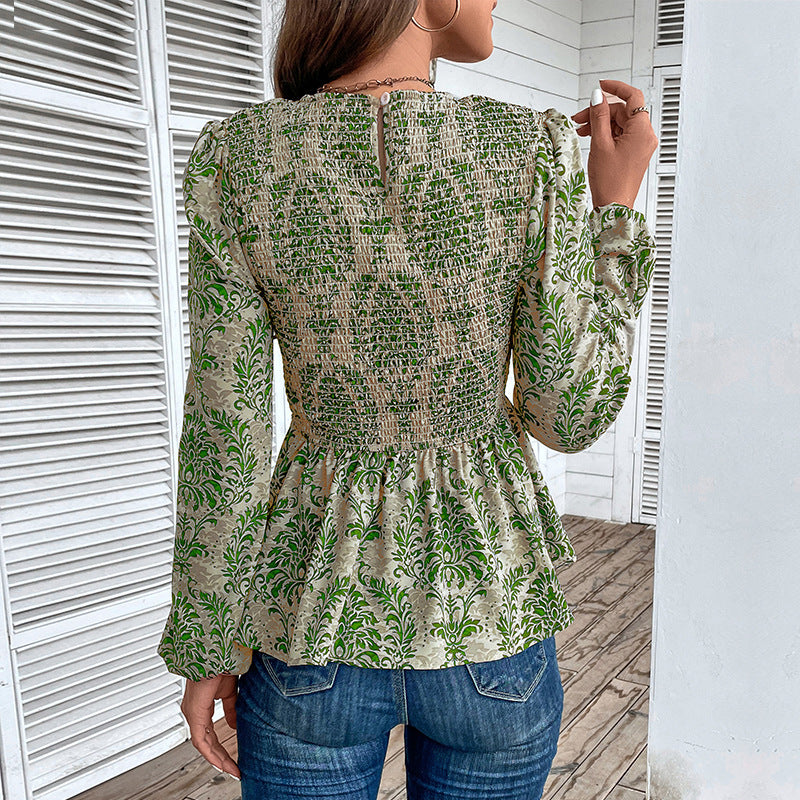 Women's smock blouse with gathering, balloon sleeves, and ornament print Chichicherry