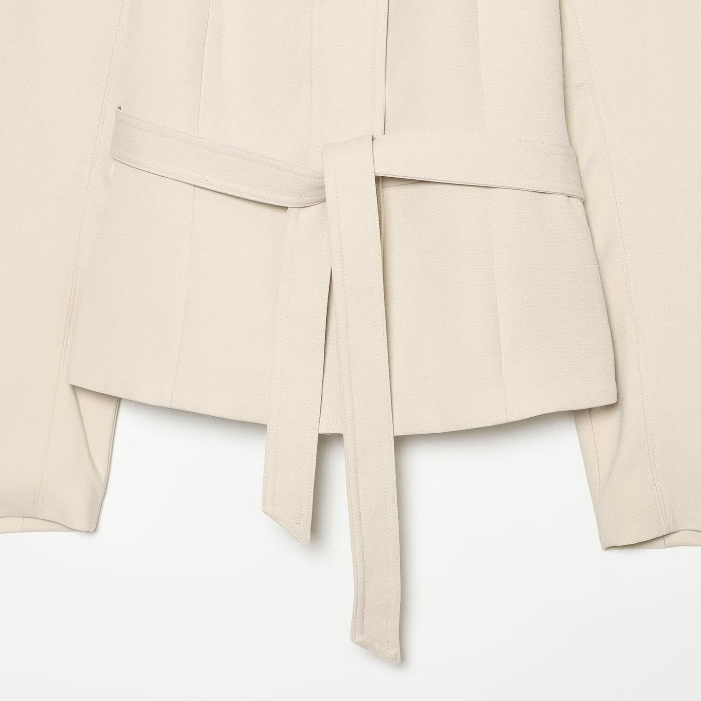 Women's cropped jacket in minimalist trench style with wide shirt collar and tie belt Chichicherry