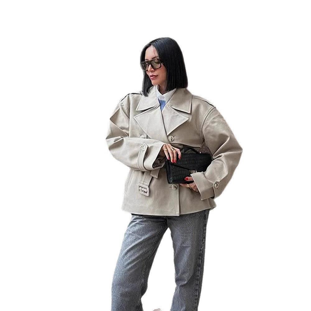 Women's short trench-style jacket with a tailored tie belt and wide sleeves Chichicherry