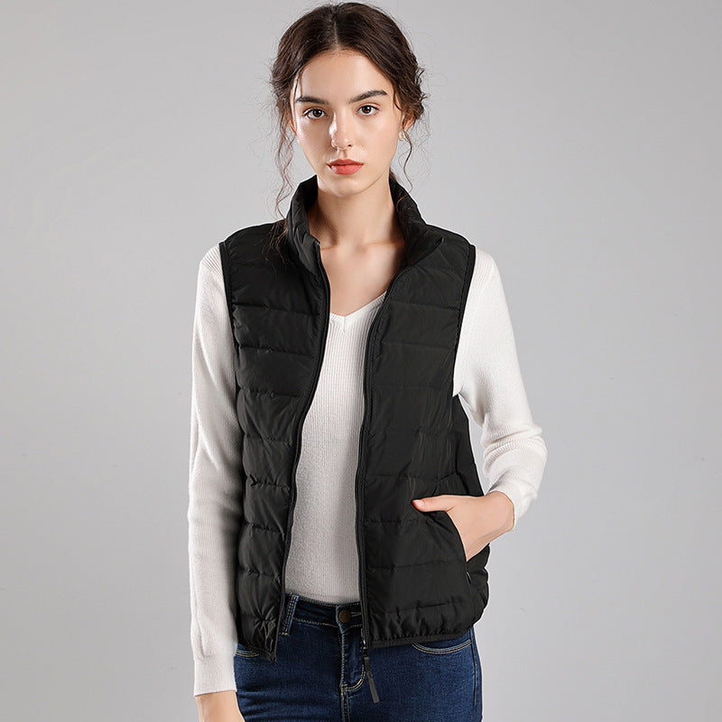 Women's packable quilted vest with flat down look, stand-up collar and side slip pockets Chichicherry