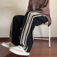 Men's loose training pants with elastic drawstring waistband, side contrast stripe & relaxed baggy fit Chichicherry