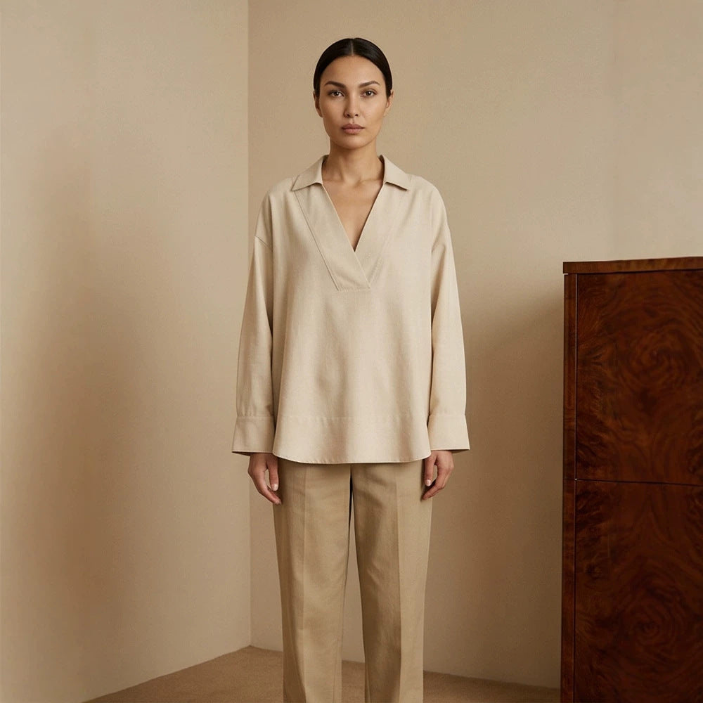 Women's loose-fitting tunic blouse with V-neck, shirt collar, and extended back hem Chichicherry