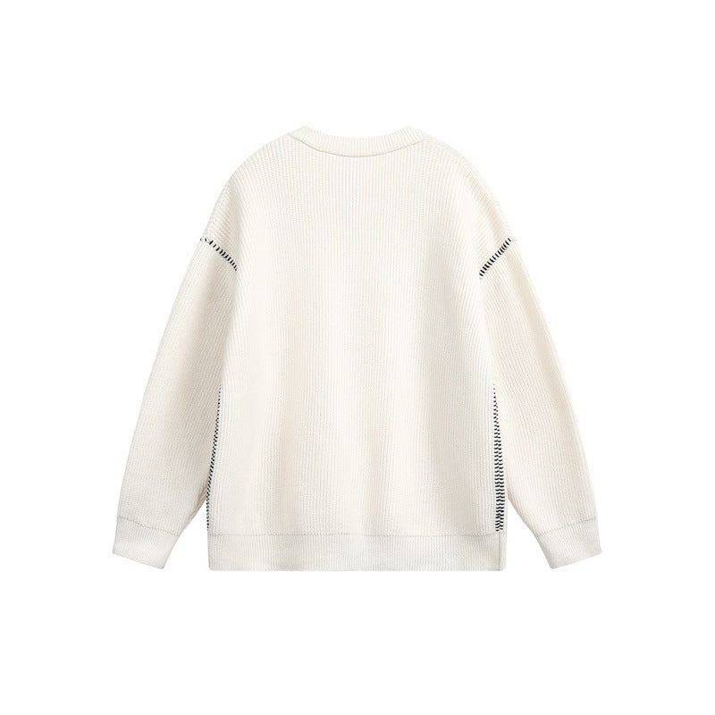 Unisex chunky knit henley pullover with button placket and drop shoulder drape