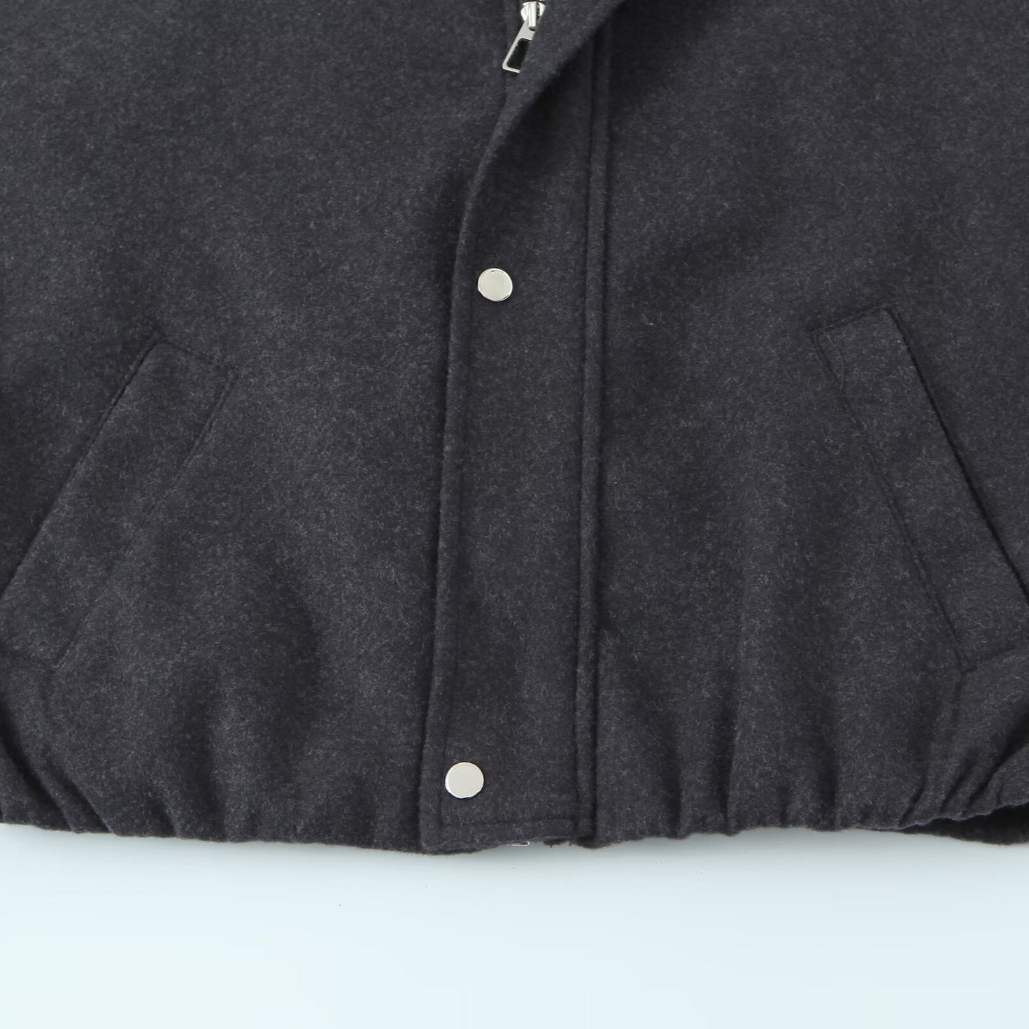 Women's short bomber-style jacket with stand-up collar, snap button placket, and elastic hem Chichicherry
