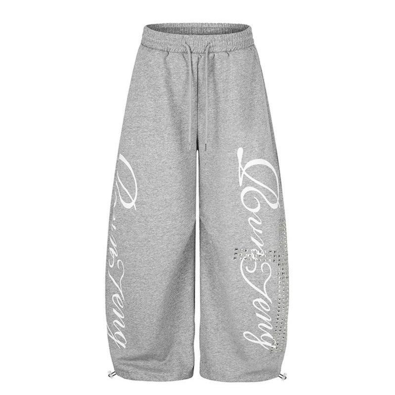 Women's Palazzo Sweatpants in Culotte Style with High Waist, Drawstring, Text Print and Rhinestone Trim Chichicherry