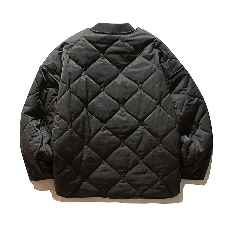 Unisex Lightweight Boxy Puffer Jacket with distinctive diamond quilting, front round pockets, and ribbed collar Chichicherry