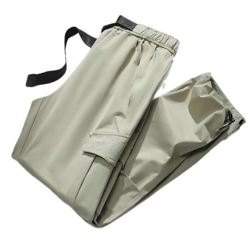 Men's cargo joggers with elastic waistband, drawstring, adjustable leg cuffs, and patch pockets.