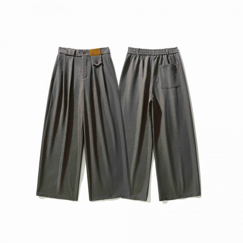 Women's wide culotte pants with knife pleats, high waistband, and decorative button detail Chichicherry