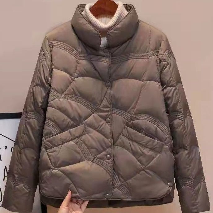Women's quilted thermal jacket with high collar and decorative wave quilting Chichicherry