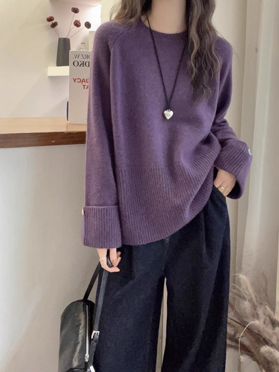 Women's oversized fine knit sweater with wide ribbed cuffs, extra wide sleeve endings, and decorative button Chichicherry