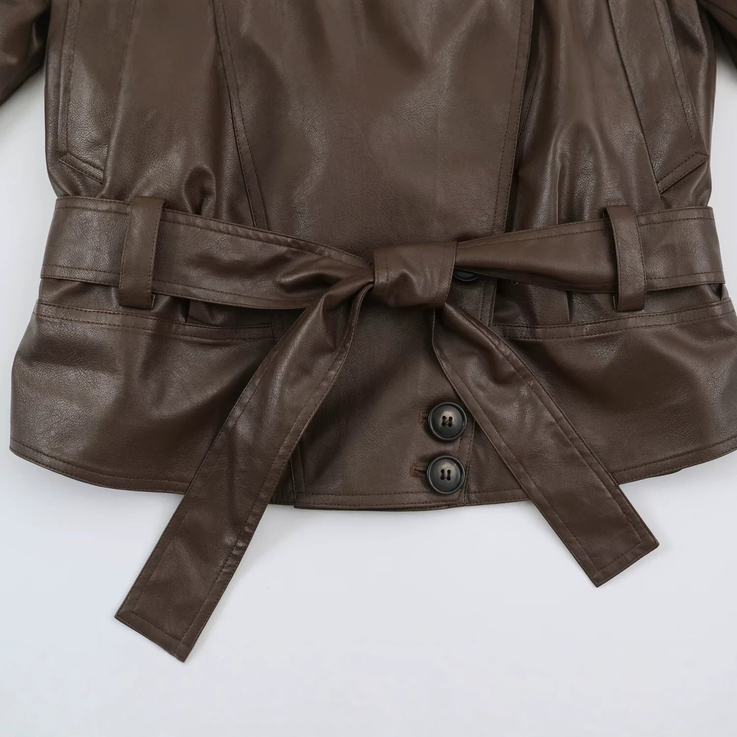 Women Tailored Leather Look Jacket with Asymmetrical Button Placket and Ties Belt Chichicherry